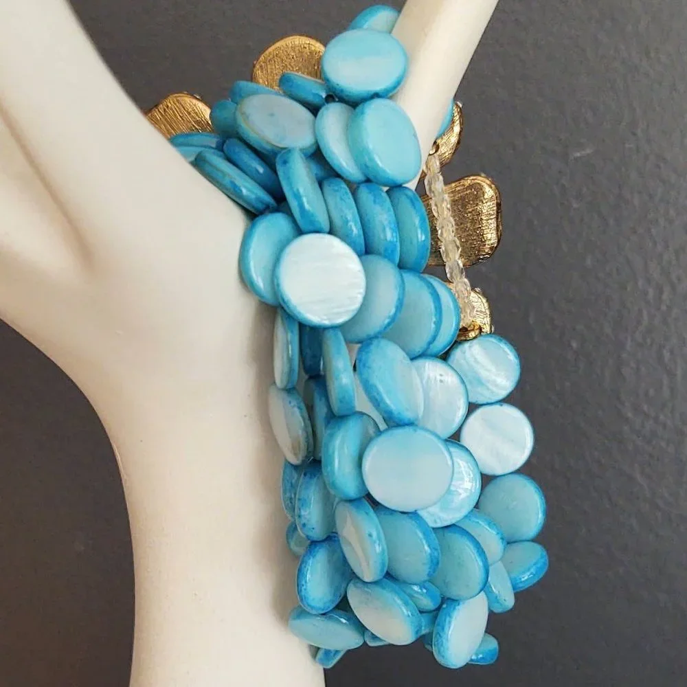 Dyed shell stretch bracelet w/enamel flower& cz's